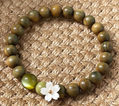 8mm Green Sandalwood Single Strand Bracelet with Sakura Bead