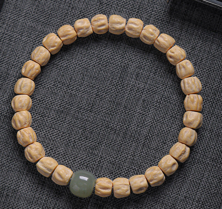 6–7mm Tibetan Style Seed Bracelet with Green Jade Accent