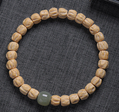 6–7mm Tibetan Style Seed Bracelet with Green Jade Accent