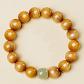Golden Sandalwood Bracelet with Jade Bead Accents