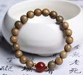 Green Sandalwood Bracelet with Red Bead Accents