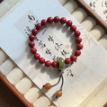 Cinnabar Bracelet with Green Jade Running Ring and Gourd Charm