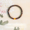 He Li Wood Bead Bracelet