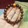 Black Rosewood Bead Bracelet with Yellow Barrel Bead & Gold Spacer