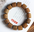 Green Sandalwood Carved Buddha Word Barrel Bead Bracelet